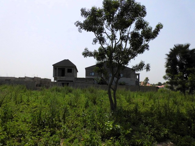 Empty land for sale at Tujereng Estate